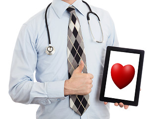 Image showing Doctor holding tablet - Red heart