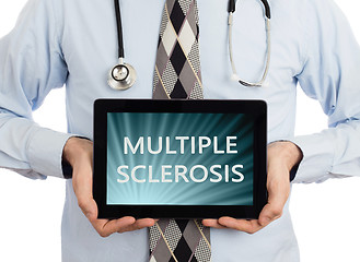 Image showing Doctor holding tablet - Multiple sclerosis