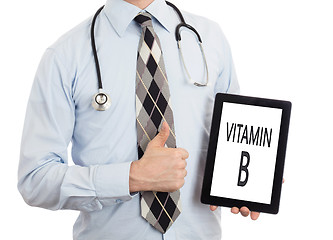 Image showing Doctor holding tablet - Vitamin B