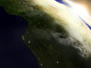 Image showing Cameroon, Gabon and Congo from space during sunrise