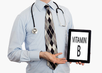 Image showing Doctor holding tablet - Vitamin B