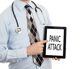 Image showing Doctor holding tablet - Panic attack