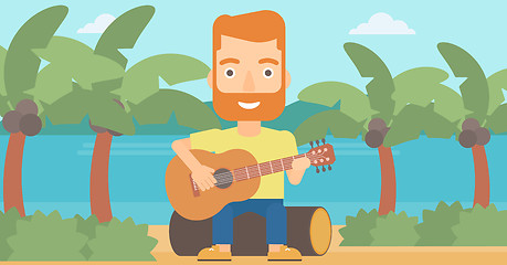 Image showing Man playing guitar.