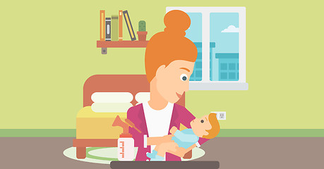 Image showing Woman with breast pump.