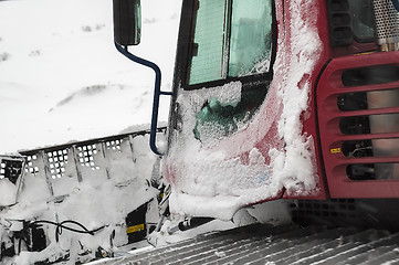 Image showing Frozen snowplow in snow blizzard