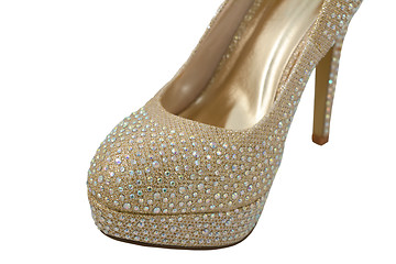 Image showing Sparkly toe of a gold fashionable high-heeled shoe