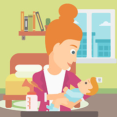 Image showing Woman with breast pump.