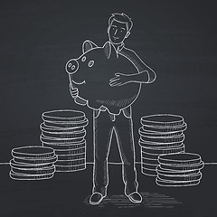 Image showing Man carrying piggy bank.