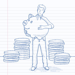 Image showing Man carrying piggy bank.