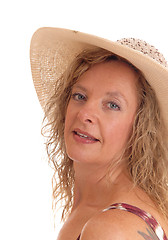 Image showing Closeup of woman with straw had hat.