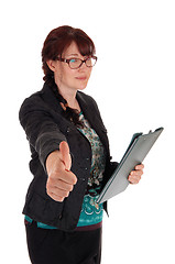 Image showing Businesswoman showing thump up.