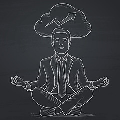 Image showing Peaceful businessman meditating.