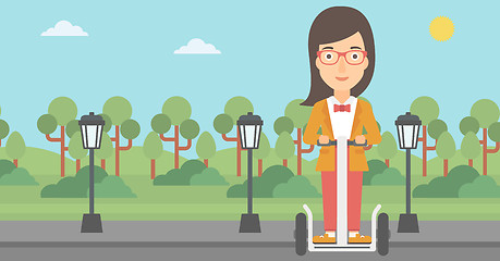 Image showing Woman riding on electric scooter.