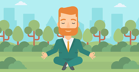 Image showing Businessman meditating in lotus pose.