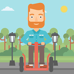 Image showing Man riding on electric scooter.