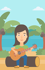 Image showing Woman playing guitar.