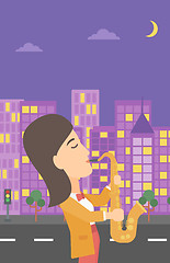 Image showing Woman playing saxophone.