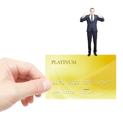 Image showing Holding credit card