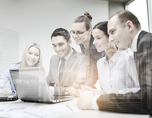 Image showing business team with laptop having discussion