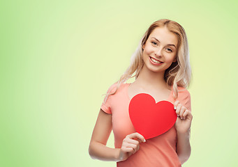 Image showing happy woman or teen girl with red heart shape