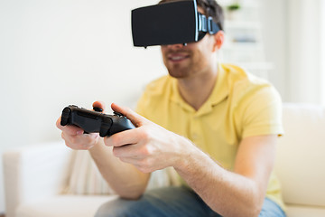 Image showing close up of man in virtual reality headset playing