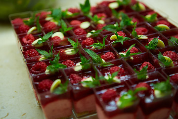 Image showing Dessert table for party. akes and sweetness. Shallow dof