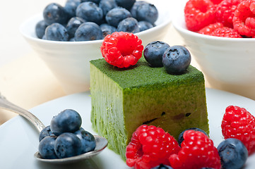 Image showing green tea matcha mousse cake with berries