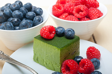 Image showing green tea matcha mousse cake with berries