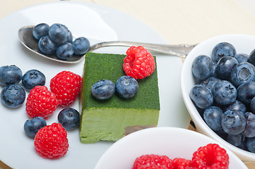 Image showing green tea matcha mousse cake with berries