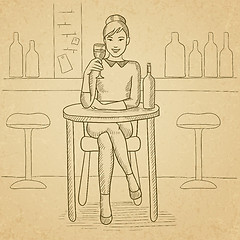 Image showing Woman sitting at bar.