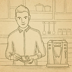 Image showing Man making coffee.