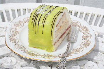 Image showing Pastry with cream and green marsipan