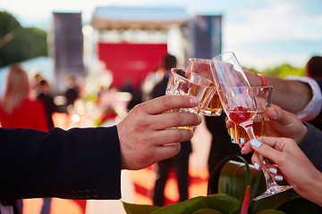 Image showing ringing filled the four glasses of champagne