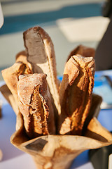 Image showing Traditional crusty French baguette bread in baskets