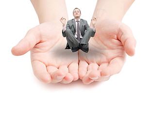 Image showing Businessman meditating