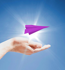 Image showing Holding a paperplane