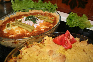 Image showing Pie with seafood and pie with chicken