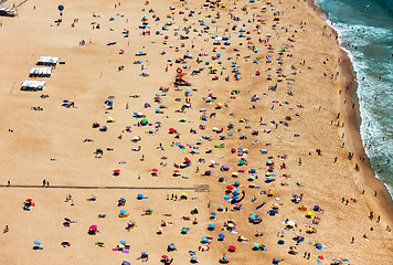Image showing Beach from Above with Many Umbrellas and People