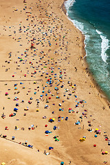 Image showing Beach from Above with Many Umbrellas and People