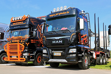 Image showing New MAN and Scania Logging Trucks on a Show