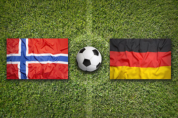 Image showing Norway vs. Germany flags on soccer field