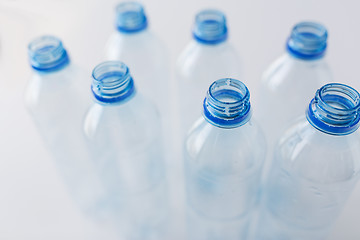 Image showing close up of empty used plastic bottles on table