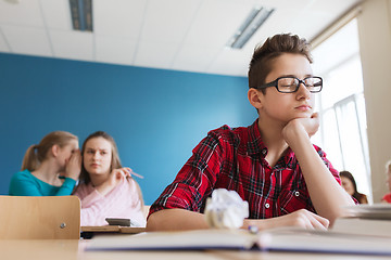 Image showing students gossiping behind classmate back at school