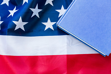 Image showing close up of american flag and book