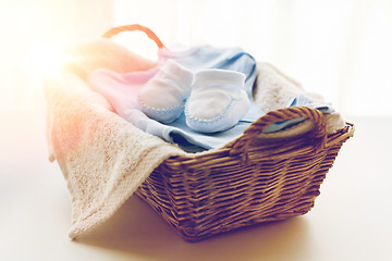 Image showing close up of baby clothes for newborn boy in basket