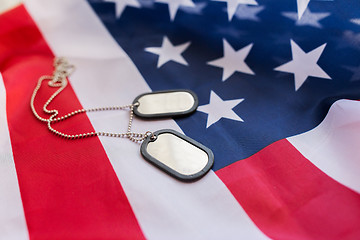 Image showing close up of american flag and military badges