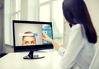 Image showing close up of woman with internet search computer