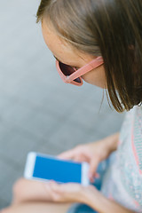 Image showing woman looking at phone