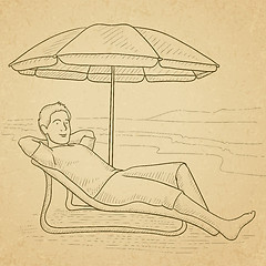 Image showing Man sitting in chaise longue.
