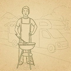 Image showing Man preparing barbecue.